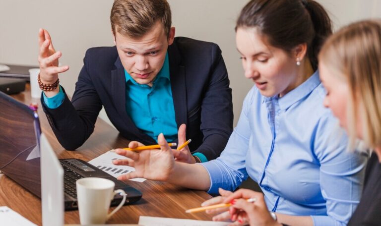 A business development executive networking at a corporate event.